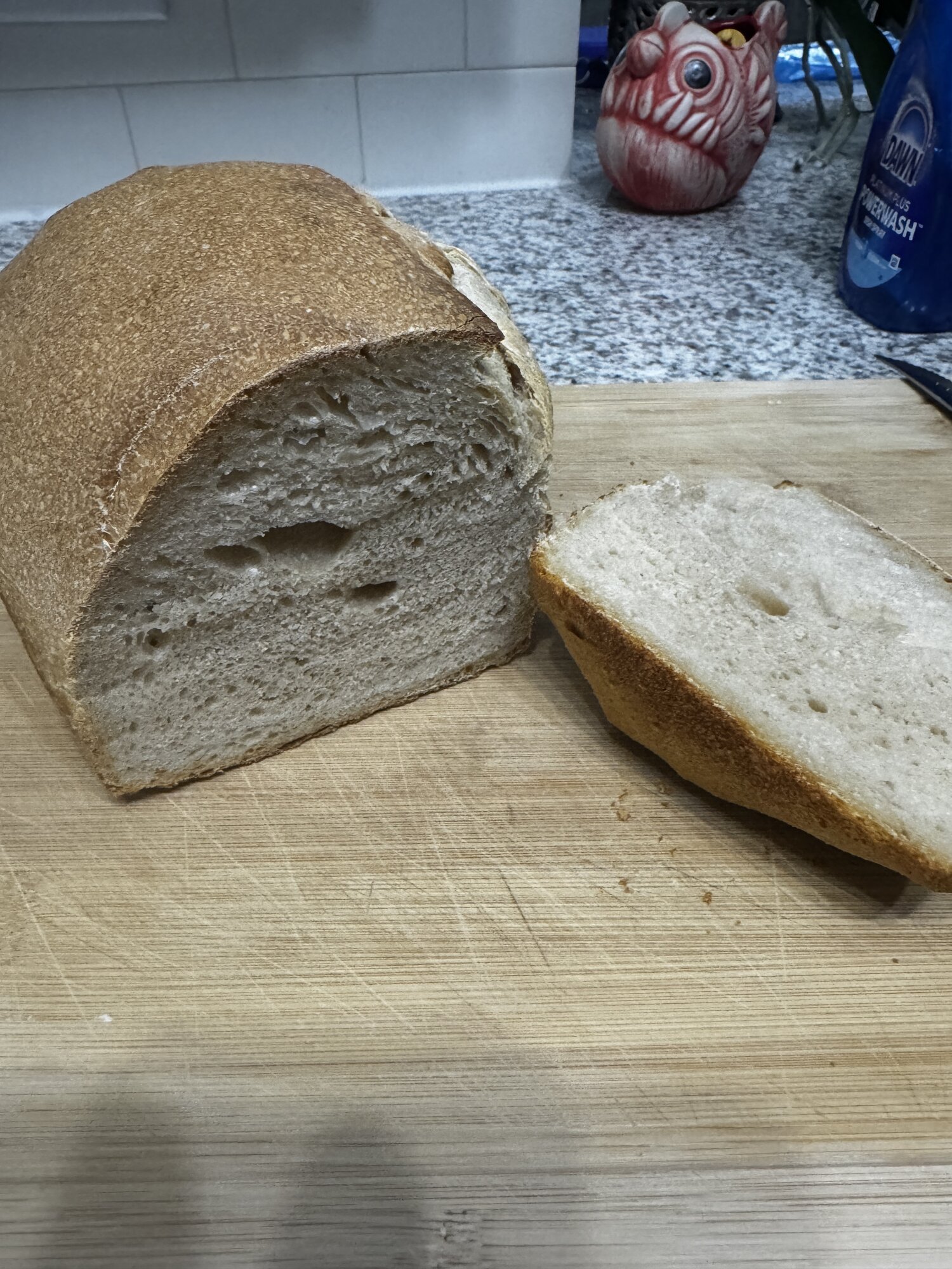 The soft, even crumb of the finished sandwich loaf.